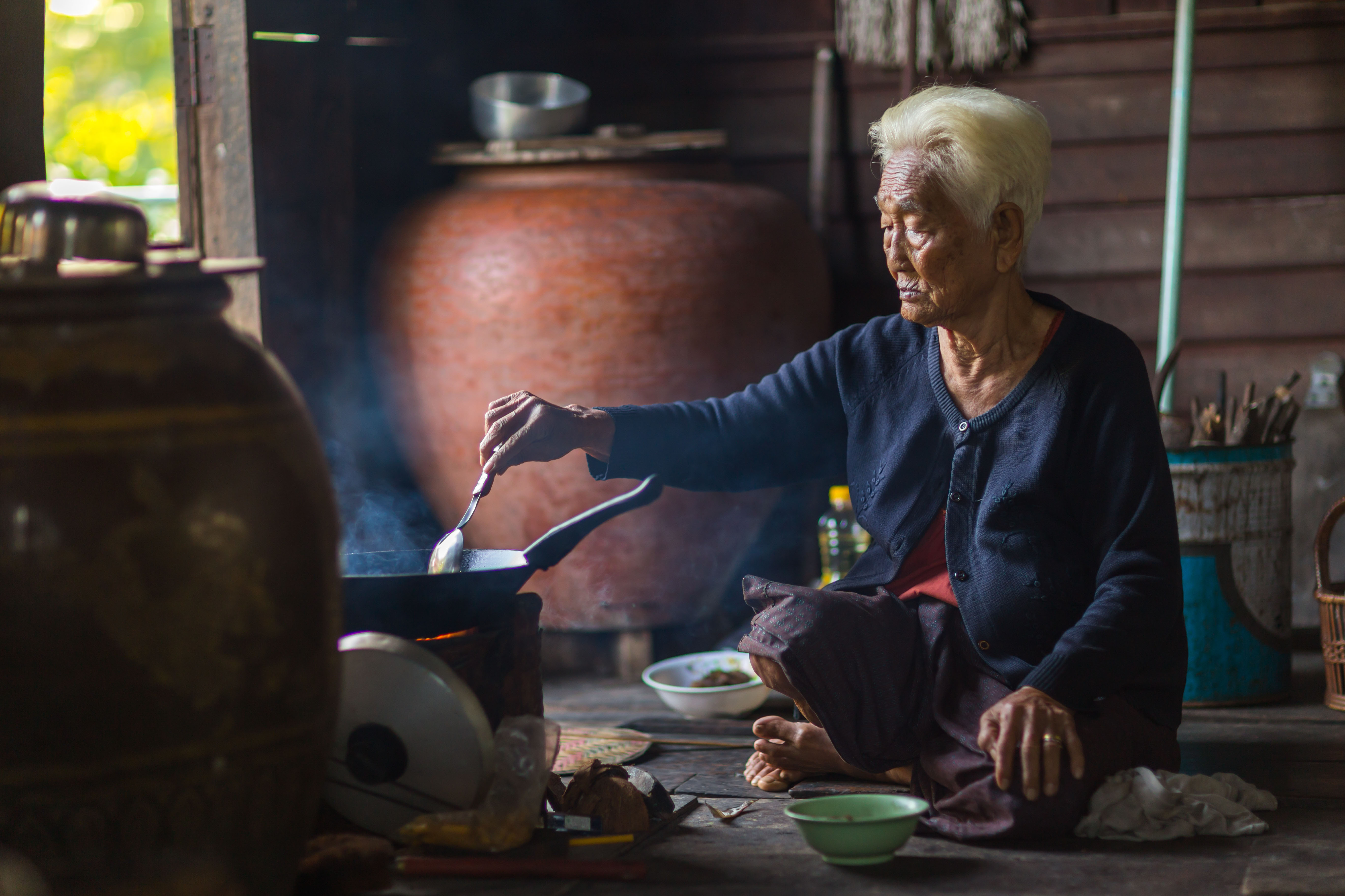 Woman traditional stove