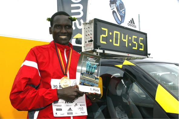 Distance runner, Paul Teregat, at a podium
