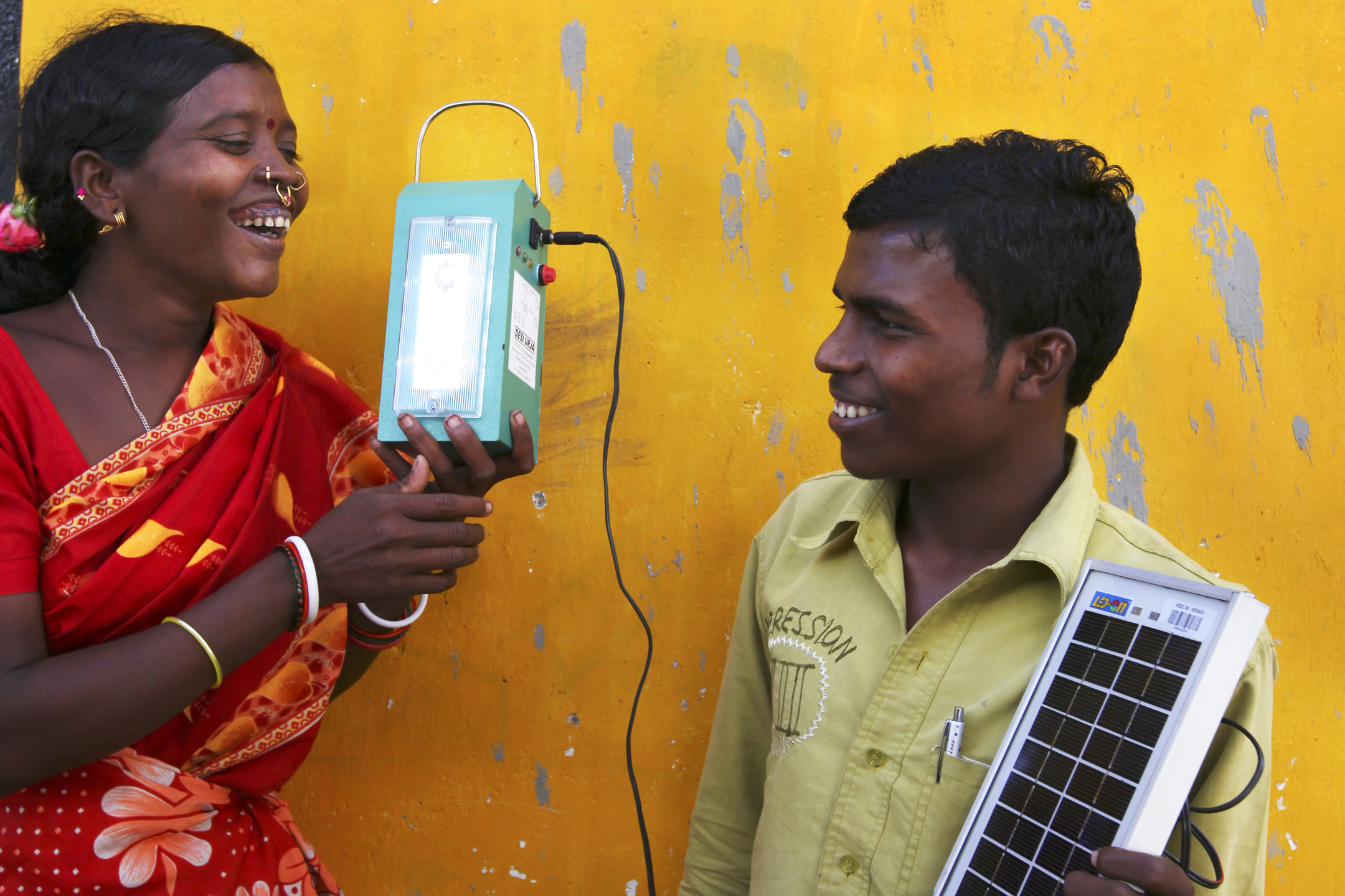 Solar power to source music player, India