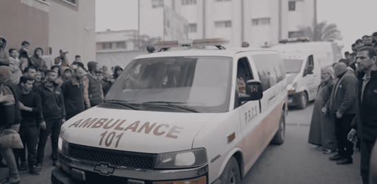 Ambulance passed through a crowd in Gaza
