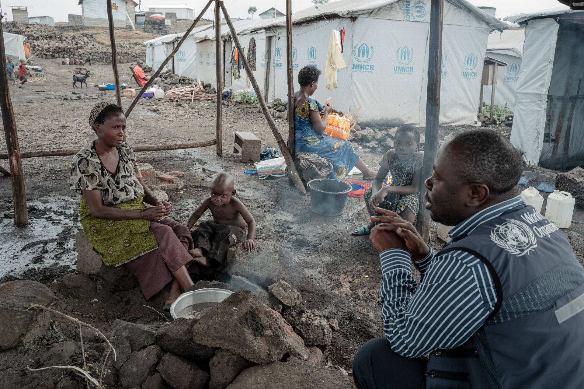 WHO Emergency Officer talks to Internally Displaced Persons in IDP Camp