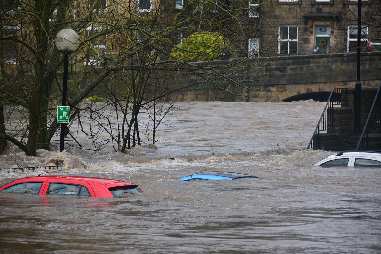 submerged cars flooded river with submerged cars