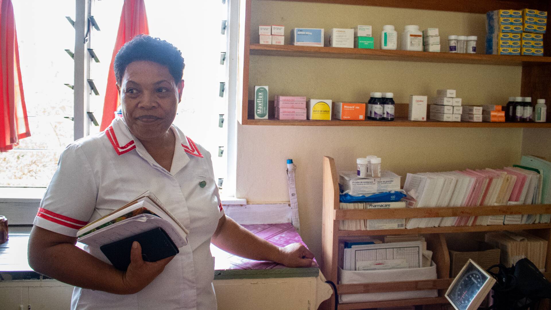 A nurse portraited at a nursing station