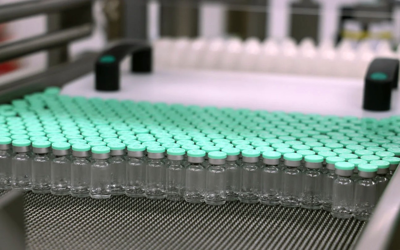 Empty vaccine vials in a factory.