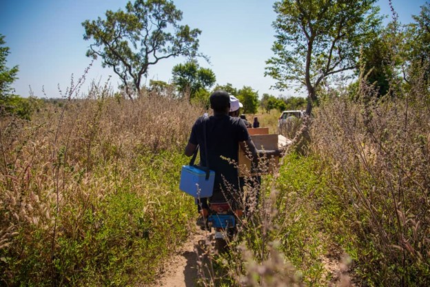 WHO supported vaccination teams going the distance to reach children in hard-to-reach areas with life-saving vaccines in an integrated immunization campaign in Niger State, Nigeria.