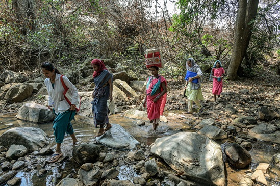 People walking in difficult terrain