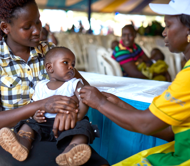 Mother and child during malaria vaccine campaign