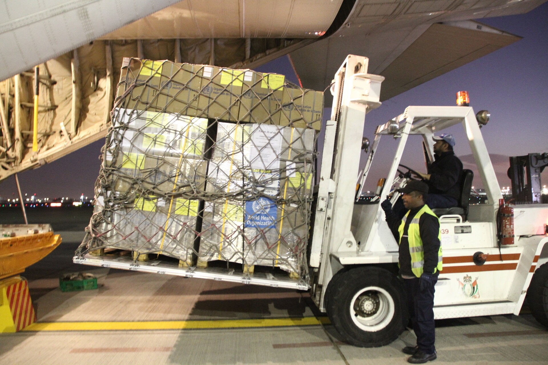 80 metric tonnes of life-saving medicines being loaded into a plane