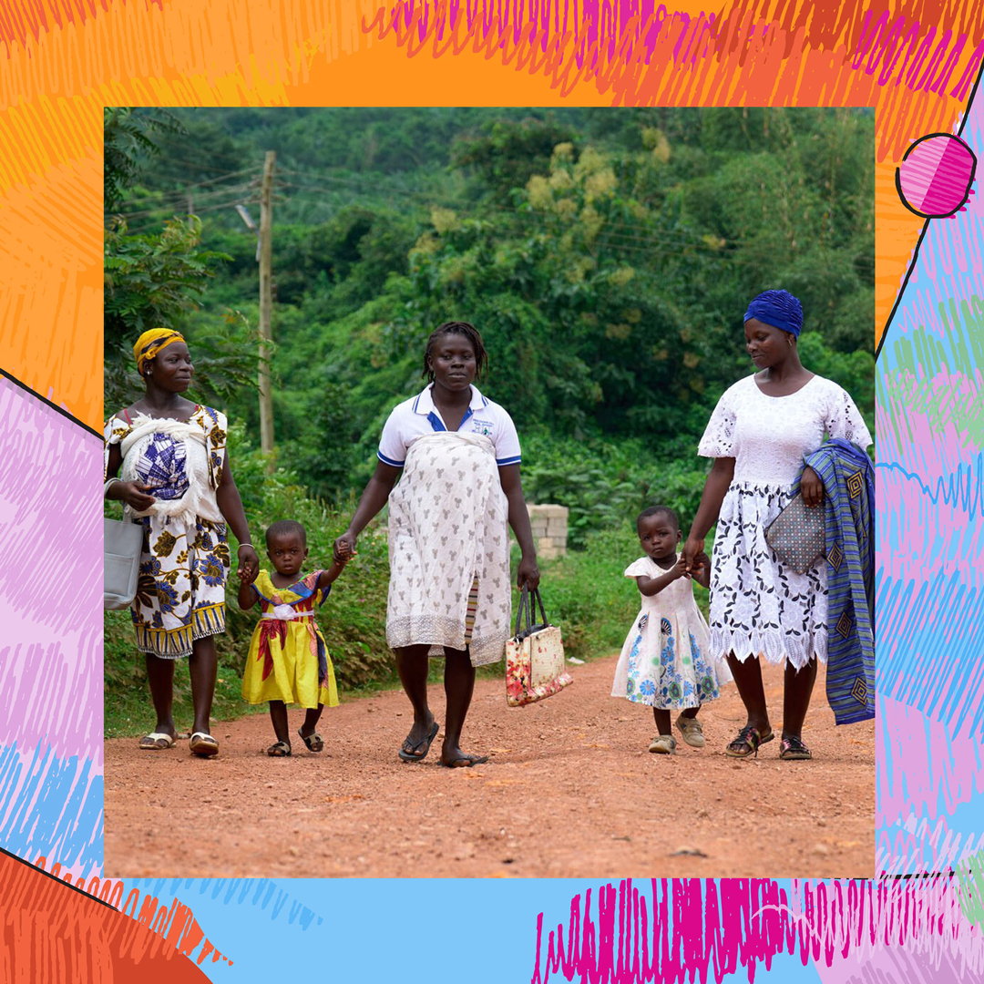 Women walking on dirt road