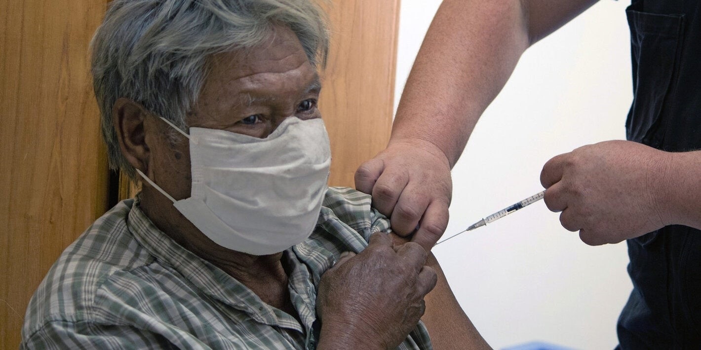A nurse is filling a health check form at COVID-19 Clinic, Samut Sakhon Hospital to identify the symptoms of the novel coronavirus A nurse is filling a health check form at COVID-19 Clinic, Samut Sakhon Hospital to identify the symptoms of the novel coronavirus