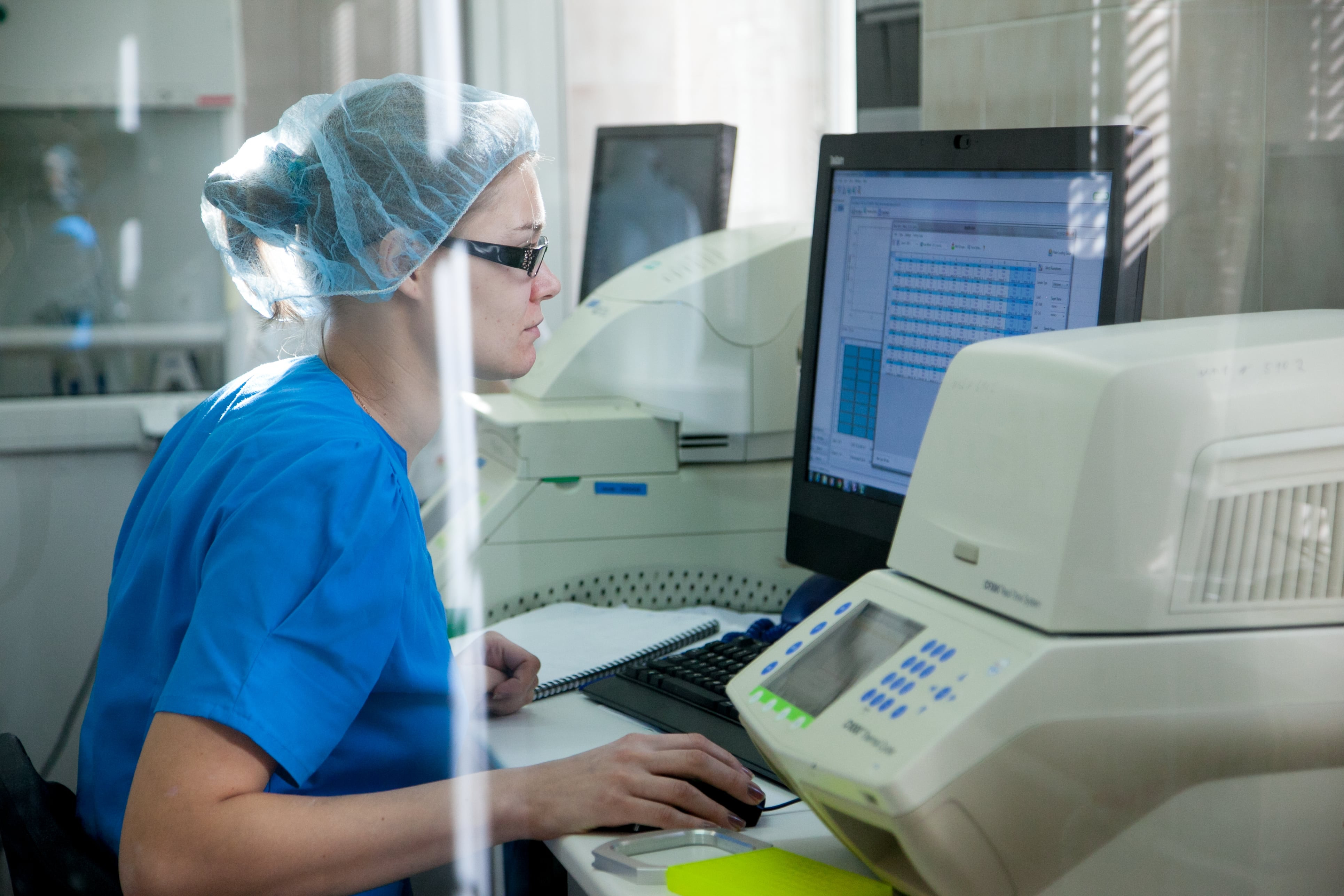A female laboratory technician analysing samples for molecular genetics at tuberculosis institute in Moscow, Russian Federation