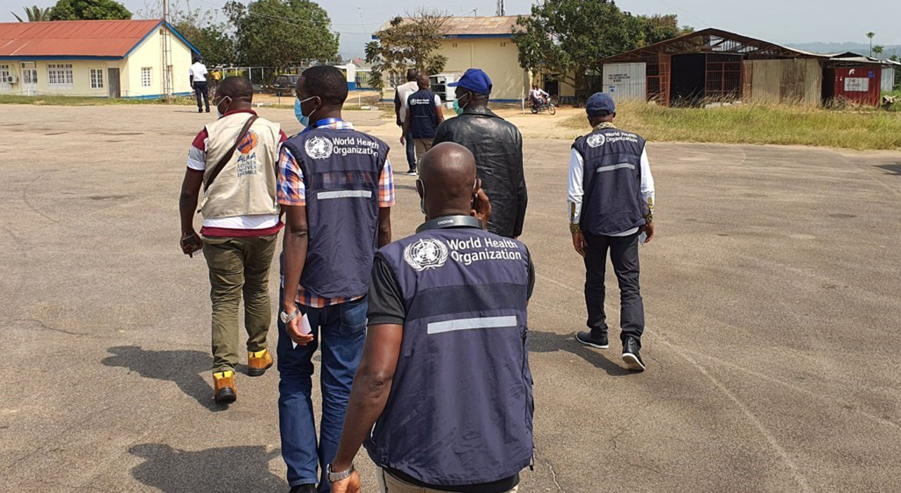 IMMAP deployee and the WHO Ebola response team