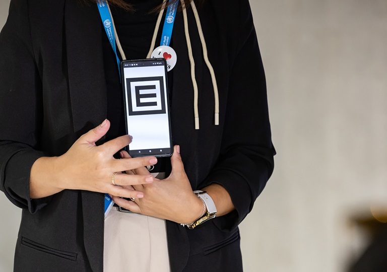 a person showing the E graph on a mobile phone