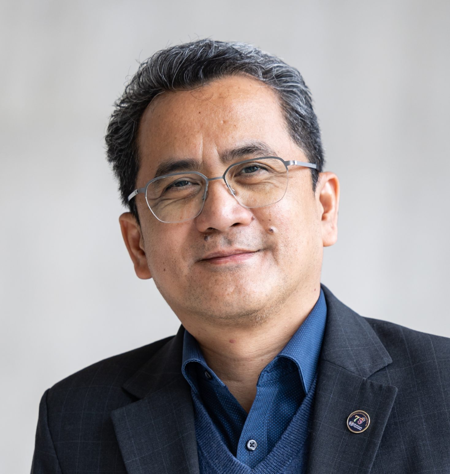 Portrait photo of Mr Bernard Tomas.