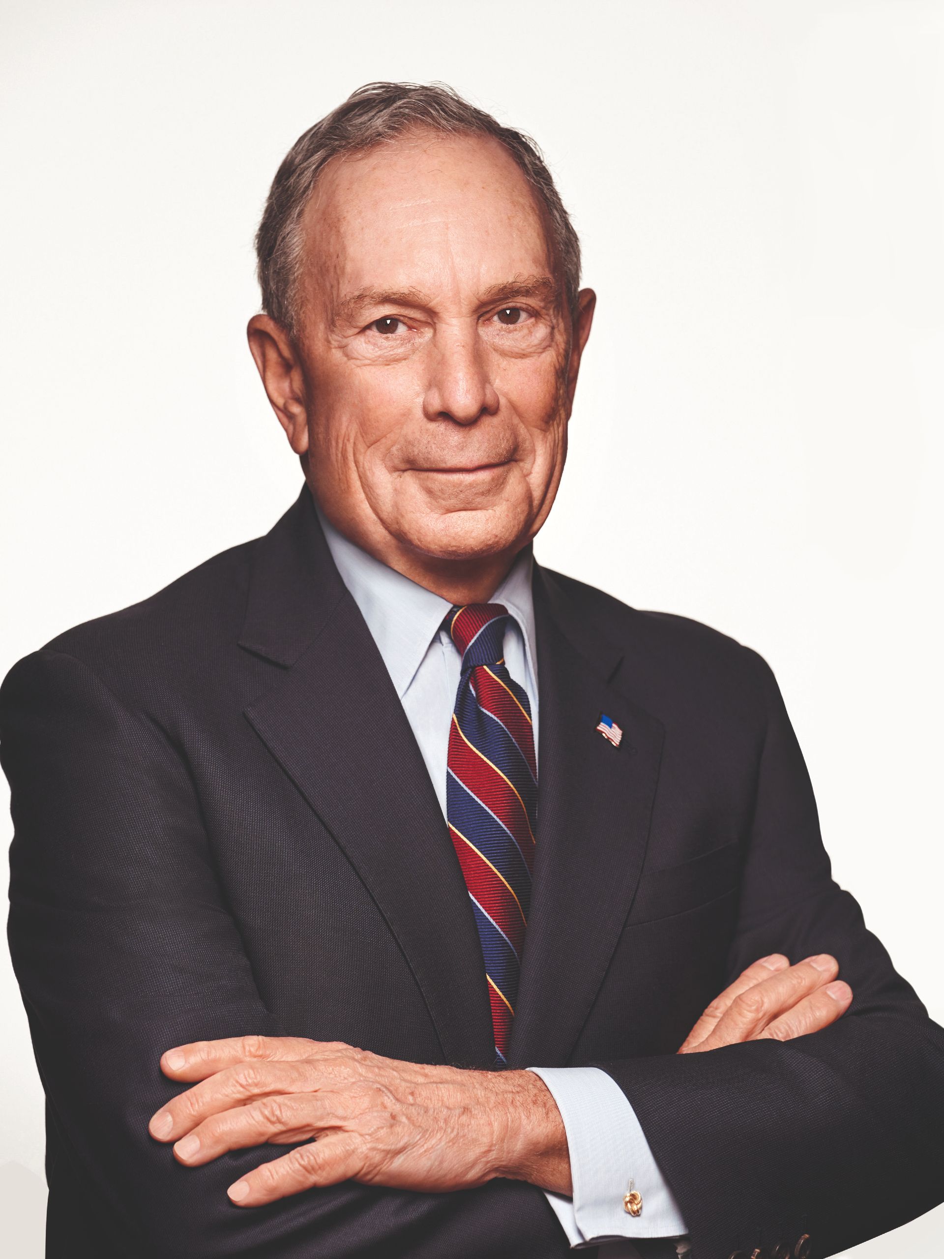 Portrait of Mr Michael R. Bloomberg dressed in a black suit and with a striped tie