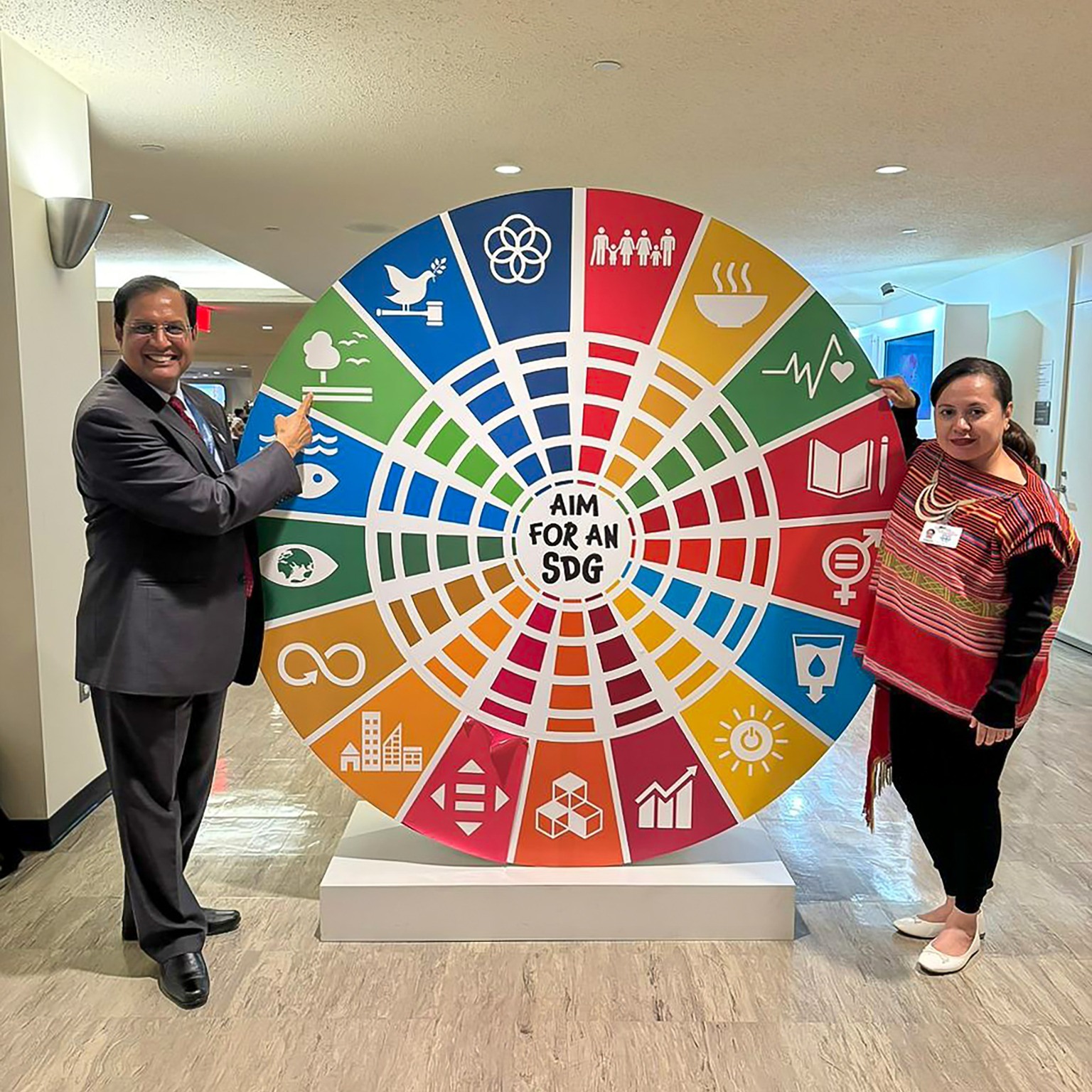 WHO Representative Dr. Arvind Mathur with Minister of Health Dr. Élia Amaral