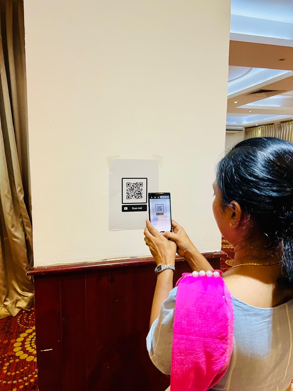Participants actively scanning the QR scan code to access the necessary materials related to the workshop.