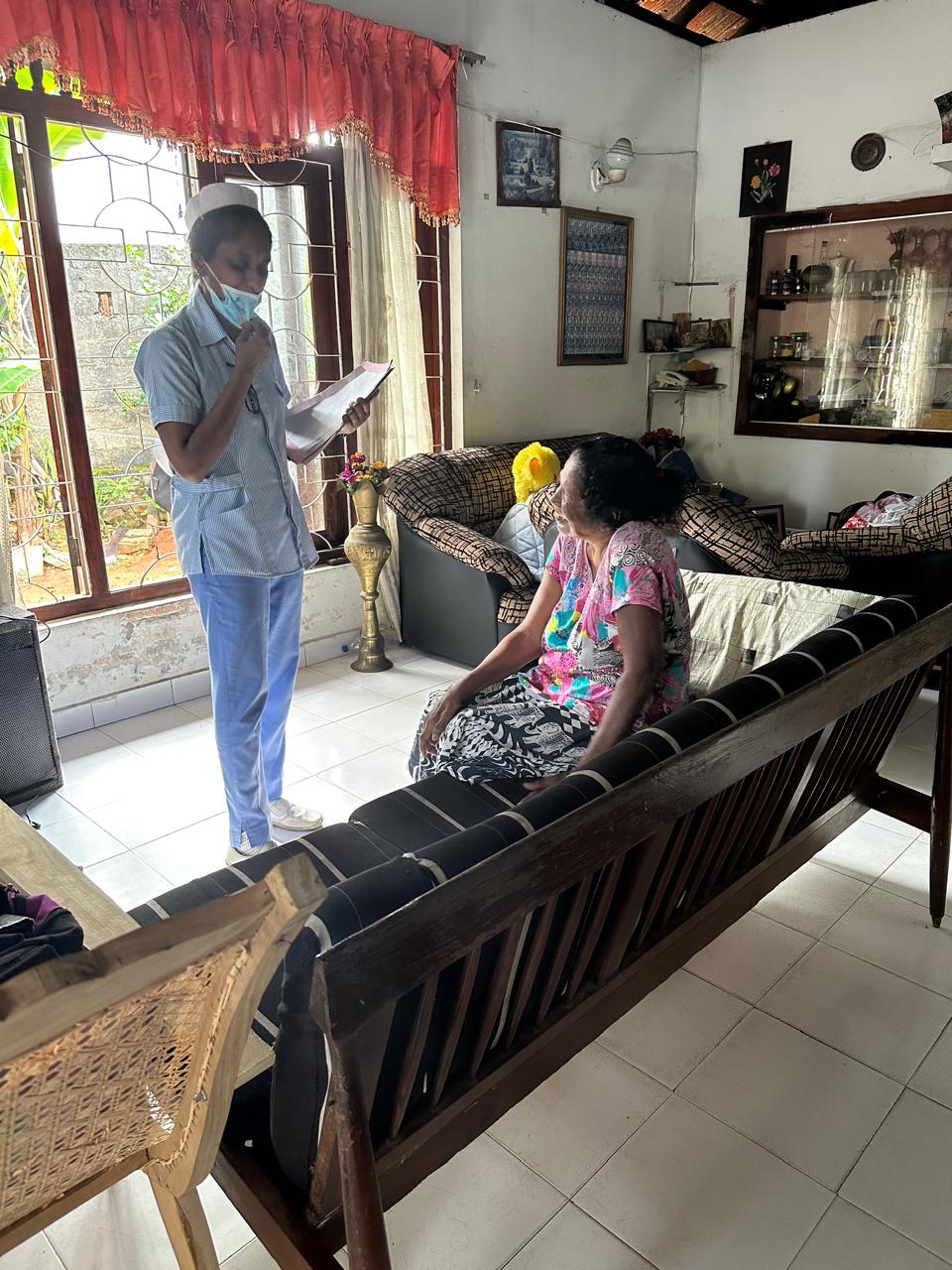 Nursing staff engaging with elders during field visits