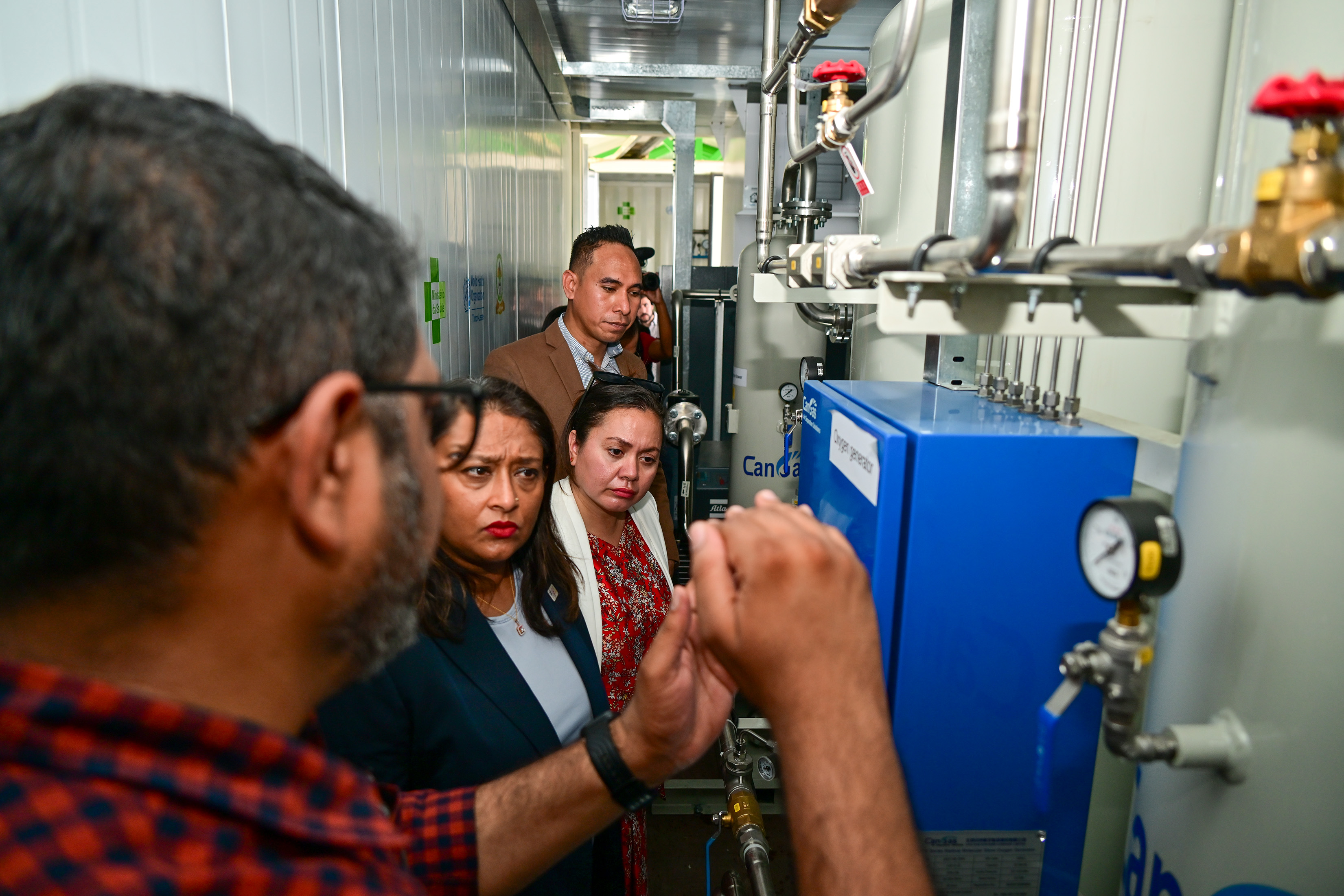 Regional Director, Saima Wazed, examining the oxygen generation systems installed in Timor-Leste, 2024