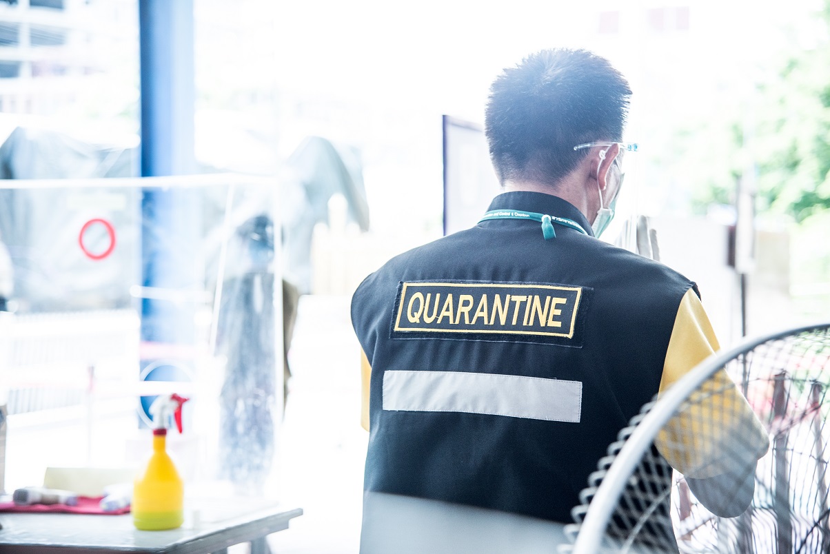 A health officer who organizes novel coronavirus quarantine for people entering Thailand from Cambodia is seen at Thailand’s Klong Luek border checkpoint on 28 May 2020