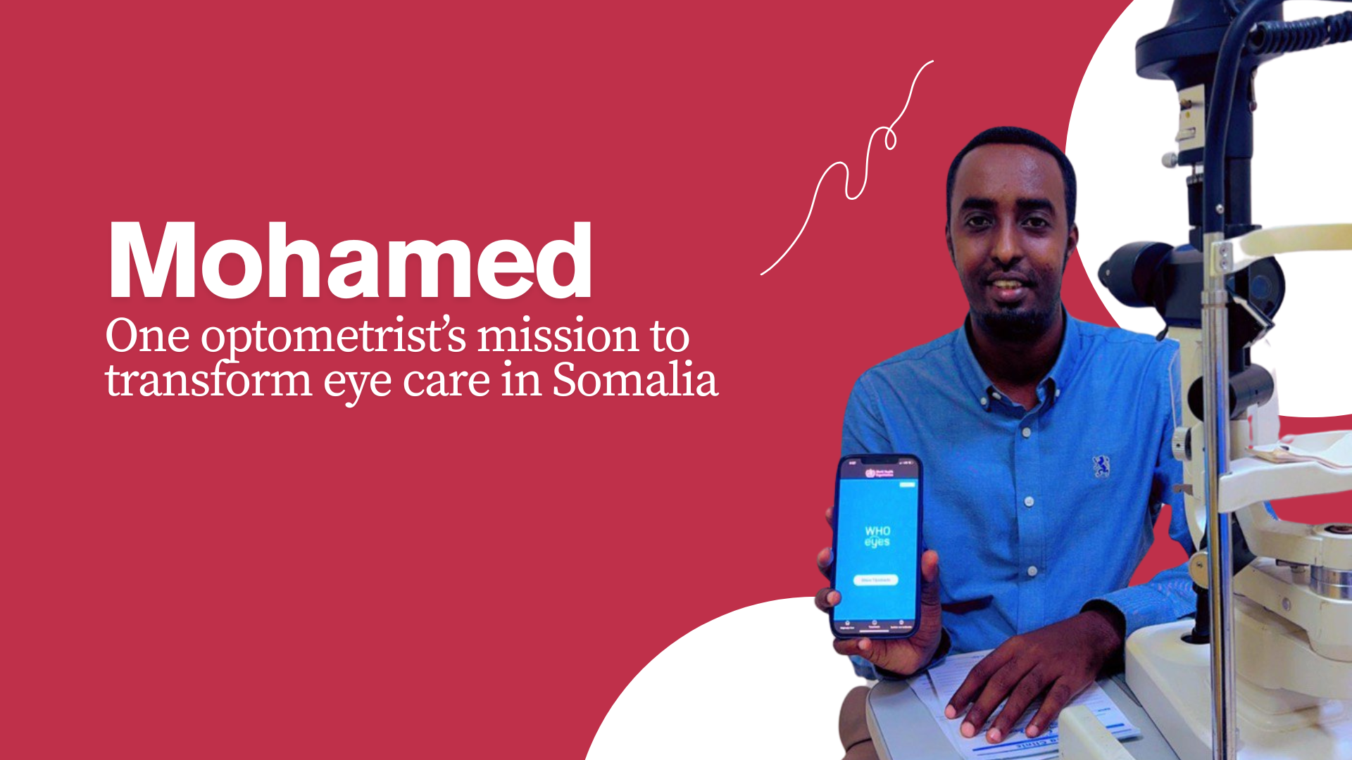 Mohamed holding a mobile on his hand - the WHOeyes app is displayed on the screen