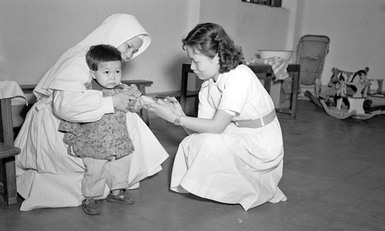 China 1950: BCG (tuberculosis) vaccination in an orphanage in Hong Kong