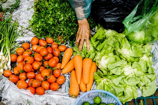 Selection of fresh vegetables at a small local market.