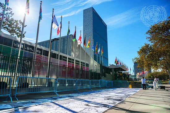 United Nations building, pictured from the outside in the sunshine.